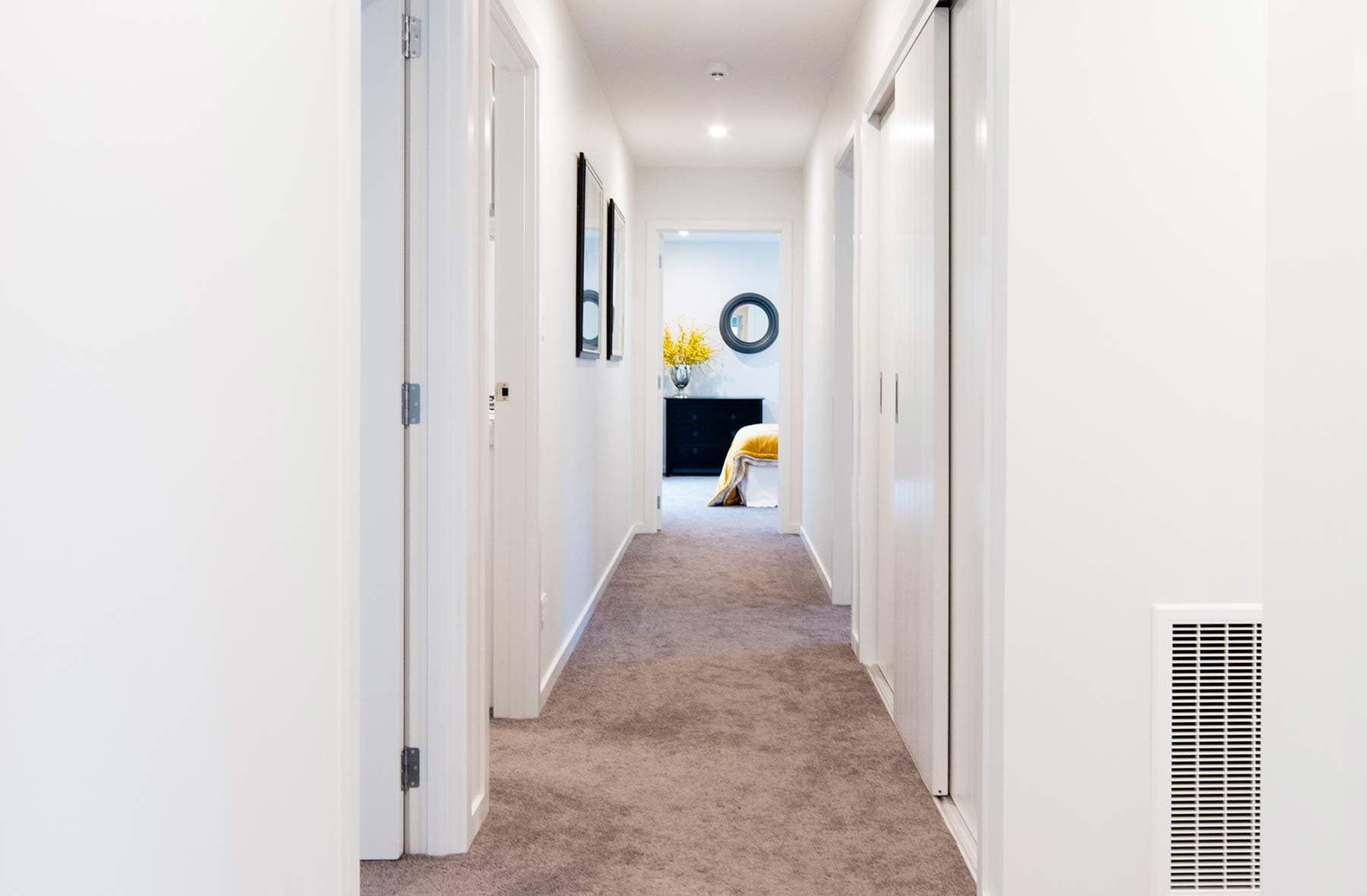 Hallway with sliding wardrobes